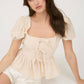 FRONT BOW DETAIL PUFF SLEEVE PEPLUM TOP