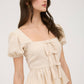 FRONT BOW DETAIL PUFF SLEEVE PEPLUM TOP