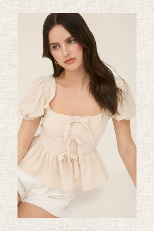 FRONT BOW DETAIL PUFF SLEEVE PEPLUM TOP