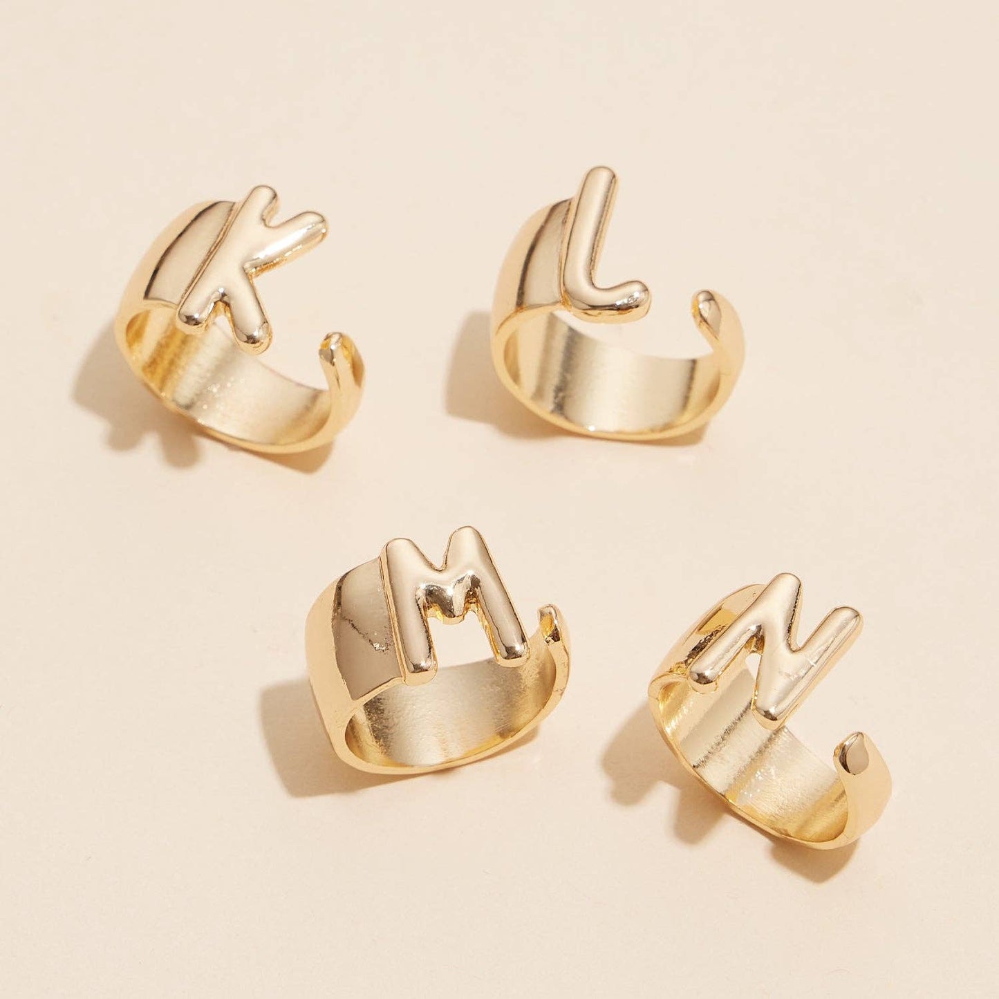 Set of 16 Bubble Design Initial Gold Plated Rings