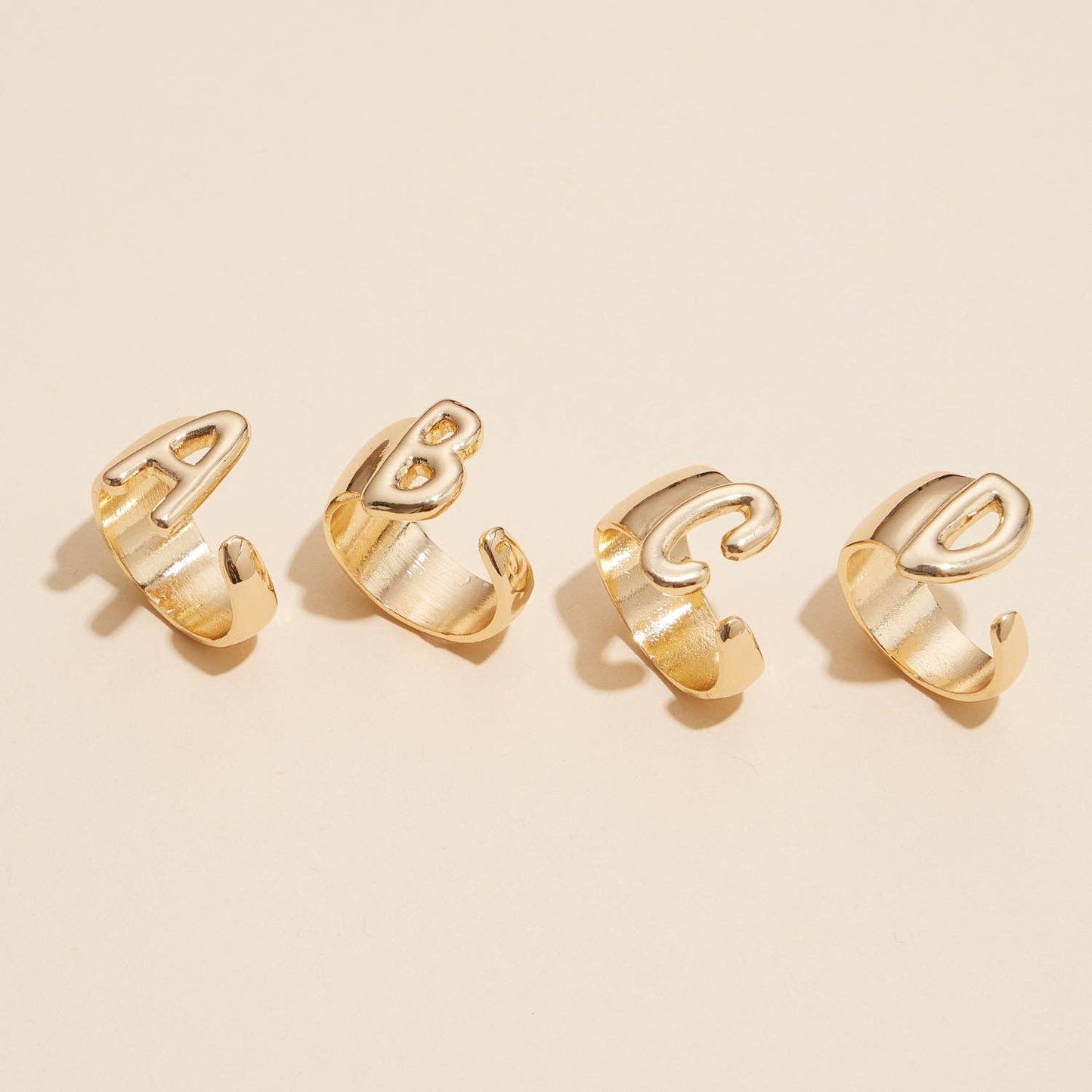Set of 16 Bubble Design Initial Gold Plated Rings