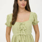 FRONT BOW DETAIL PUFF SLEEVE PEPLUM TOP