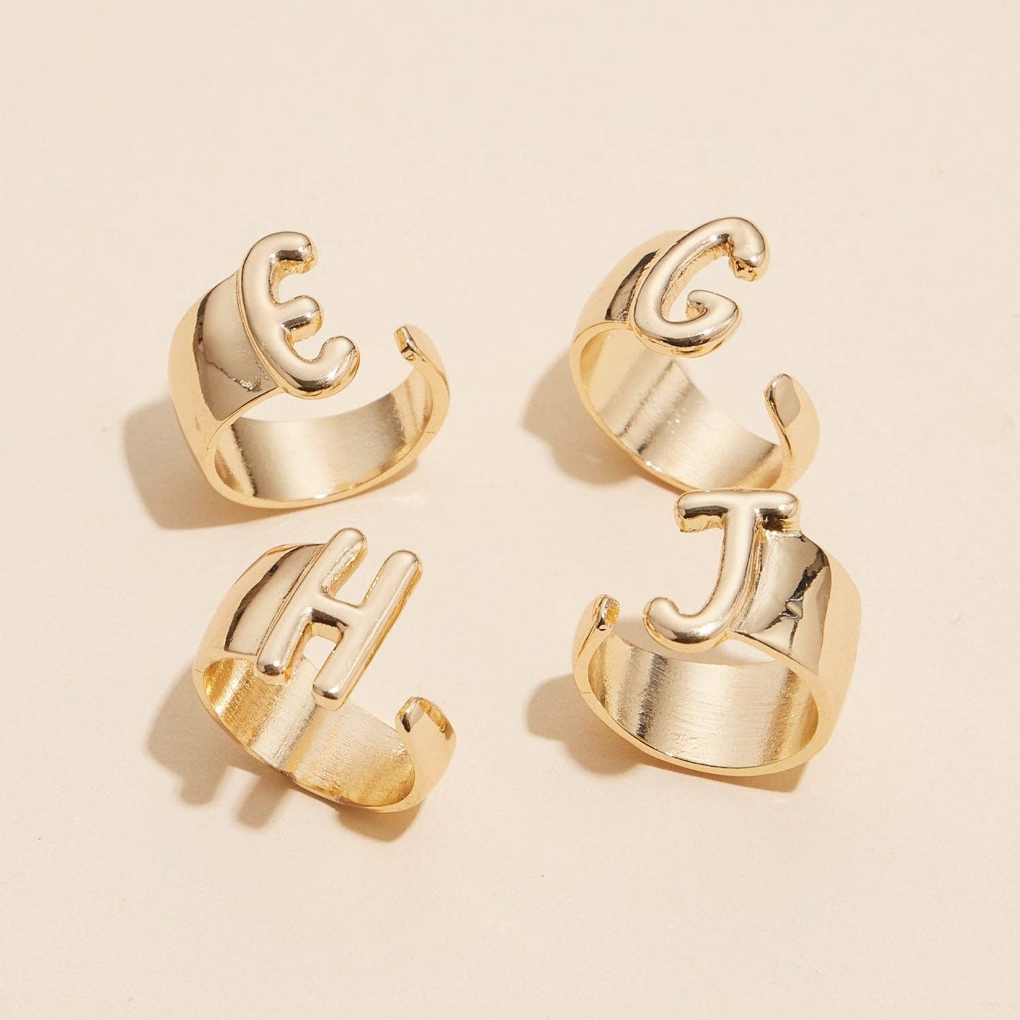 Set of 16 Bubble Design Initial Gold Plated Rings